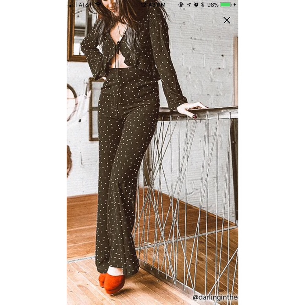 Black polka dot cut out long sleeve jumpsuit